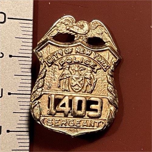 United insignia mini badge - united,